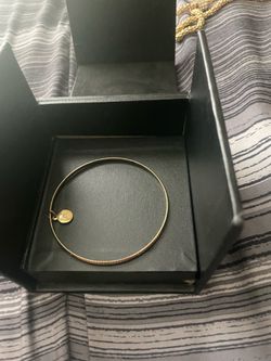 Gold bracelet with grooved pattern
