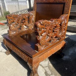 Antique Southeast Asian Carved Teak Wood Sofa Bench and Matching Chair with Elaborate Dragon Carvings and Floral Designs