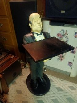 Whimsical "Heri the Butler" side table statue released by the Bombay company in 1999  34 inches tall.