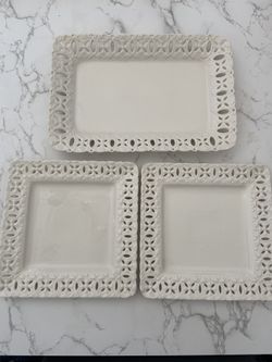 Set of porcelain serving dishes by Godinger & Co., featuring a vintage lace-edged Design 