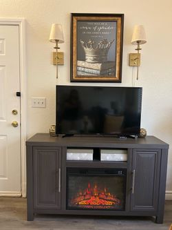Modern entertainment center with fireplace