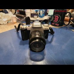 35 mm Pentak camera with genuine leather case
