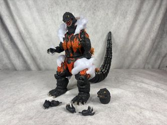 Super 7 burning Godzilla