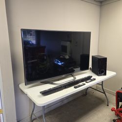 LG 60" TV With Soundbar And Bass Unit. Great Condition