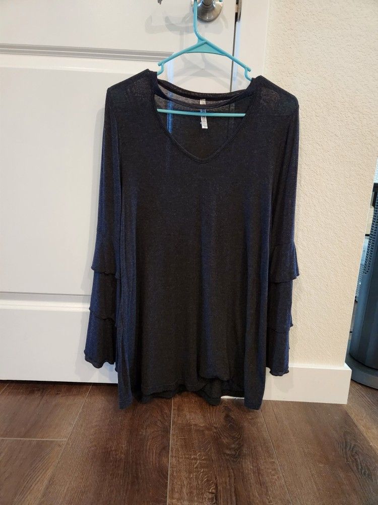Long sleeve ruffled tunic in a dark gray color. size S, good condition  