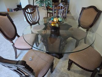 5 ft round dining table and 5 chairs