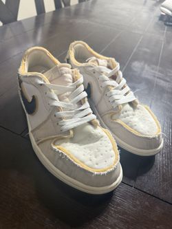 Nike Air Jordan 1 Low Inside Out (sometimes called the “Inside Out / Exposed Foam” style).