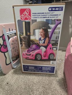 Toddler girl push buggy/car