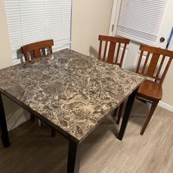 Table And 3 Chairs