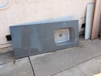 Gray Countertop with Integrated Stainless Steel Sink
