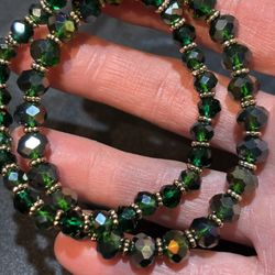 Beautiful shiny green bracelets with goldtone. So pretty for the holidays