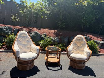 Gorgeous set of 3. 2 Bali Swivel Rocker Chairs/plush Chair Cushions, & 1 glass/wood table
