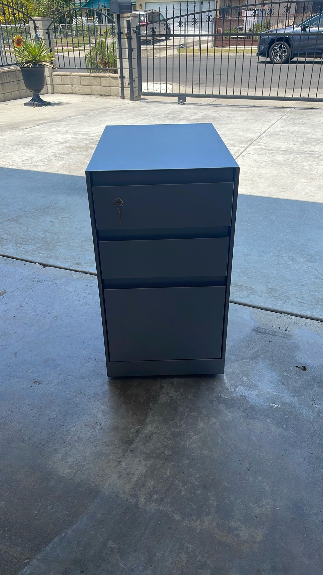 Three drawer filing cabinet with lock