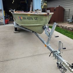 Little Fishing Boat And Trailer