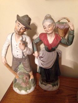 Old man and woman figurine