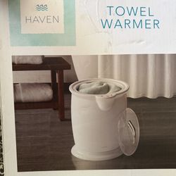 New Haven Towel Warmer. Still in box and plastic. Warms up to two oversized bath towels. Gets one towel warm in 10 minutes. Has auto shut-off. Can war