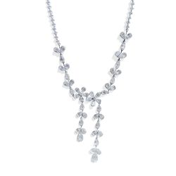 DRIPPING FLOWERS NECKLACE Gorgeous "Dripping Flowers" Necklace with 377 round brilliant diamonds weighing 5.35 carats total weight, 144 baguette diamo