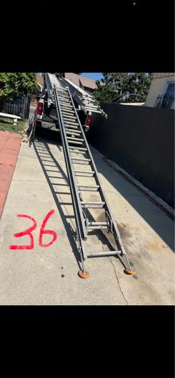 Excellent condition 36 feet and more sizes available aluminum ladder