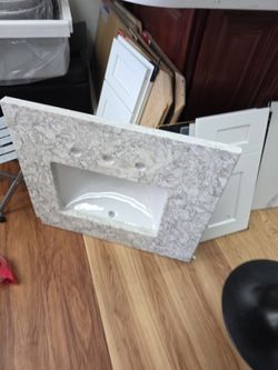 For 24" vanity cabinet ,it comes with two backsplash