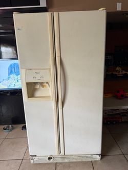 Whirlpool Side-by-Side Refrigerator with Ice and Water Dispenser