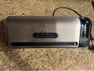 Food saver vacuum sealing system