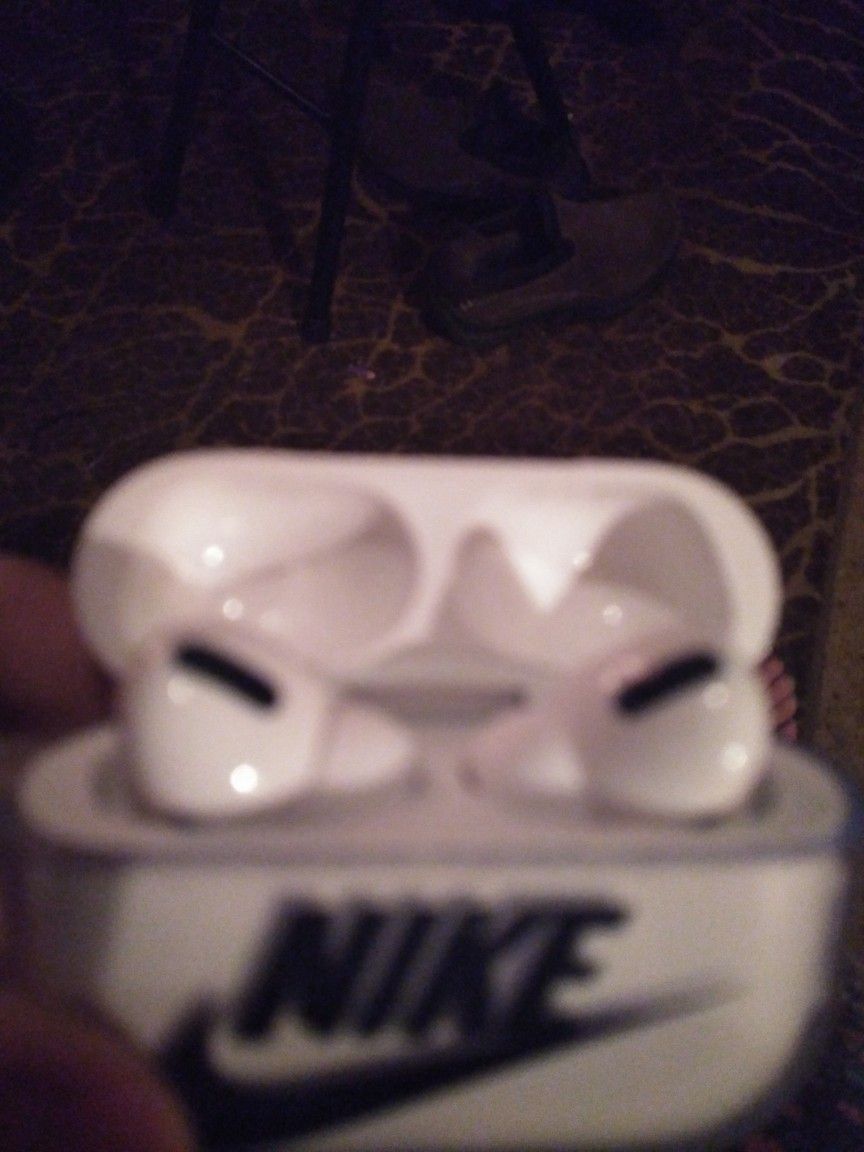 Brand New AIR PODS,. NIKE CHARGING CASE