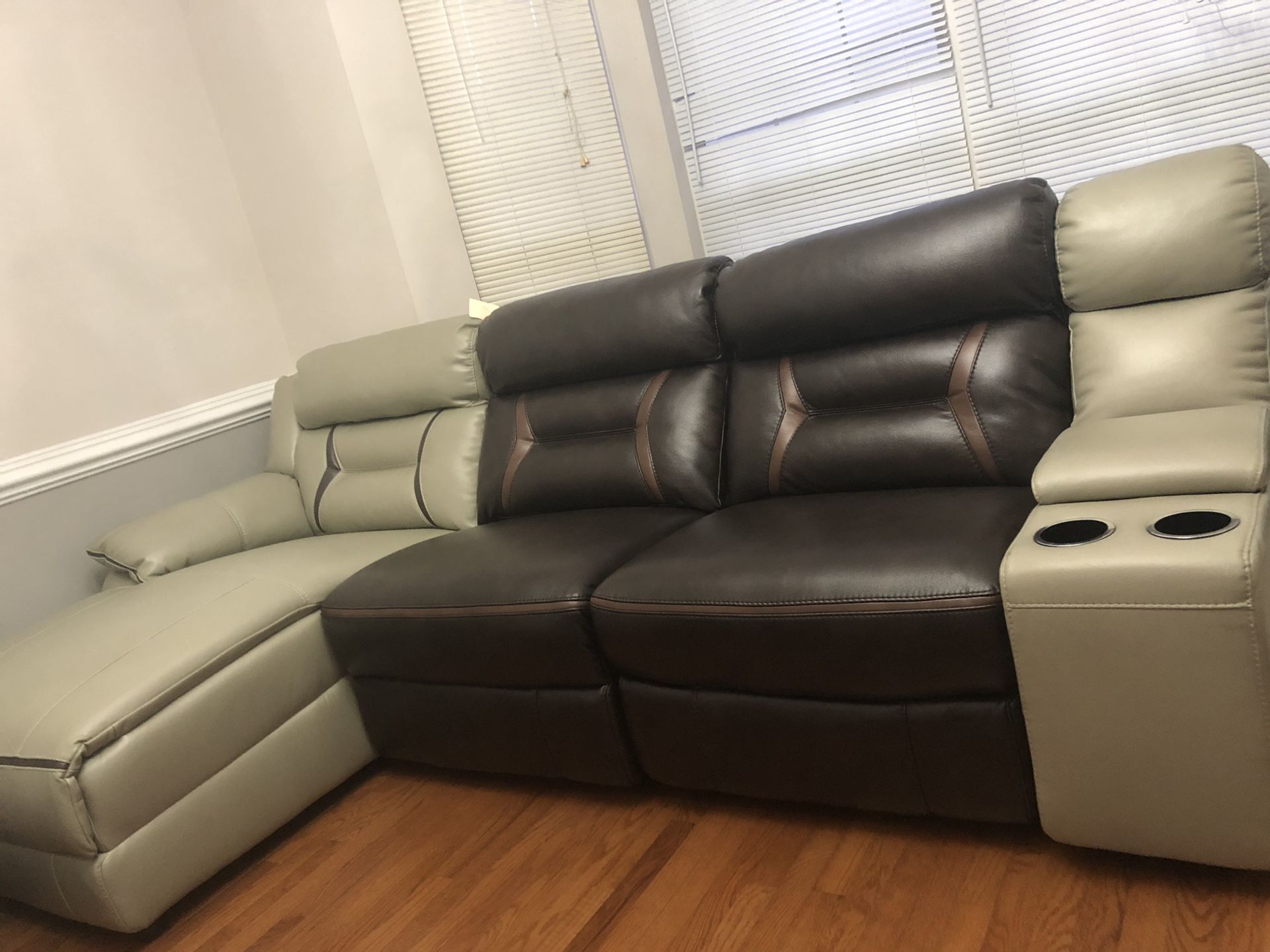 Brand new bonded leather sectional recliner priced to sell