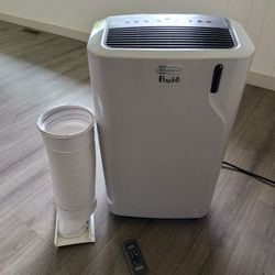 Portable Air conditioner / Dehumidifier...Delonghi With Remote 