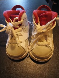 Maybe Jordan 6 Retro red and white size 4C excellent condition only one once