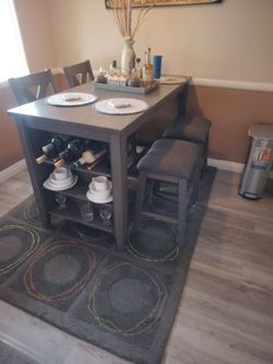 Grey 4 seat table 2 shairs 2;stools