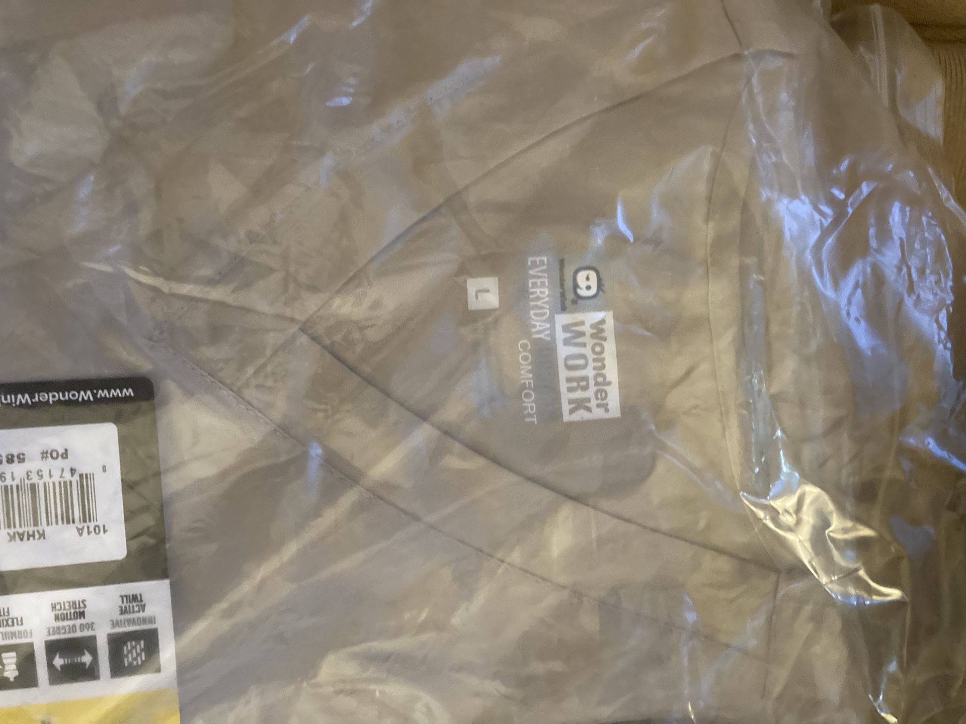 Medical Scrubs - 4 Sets of tops & bottoms - New