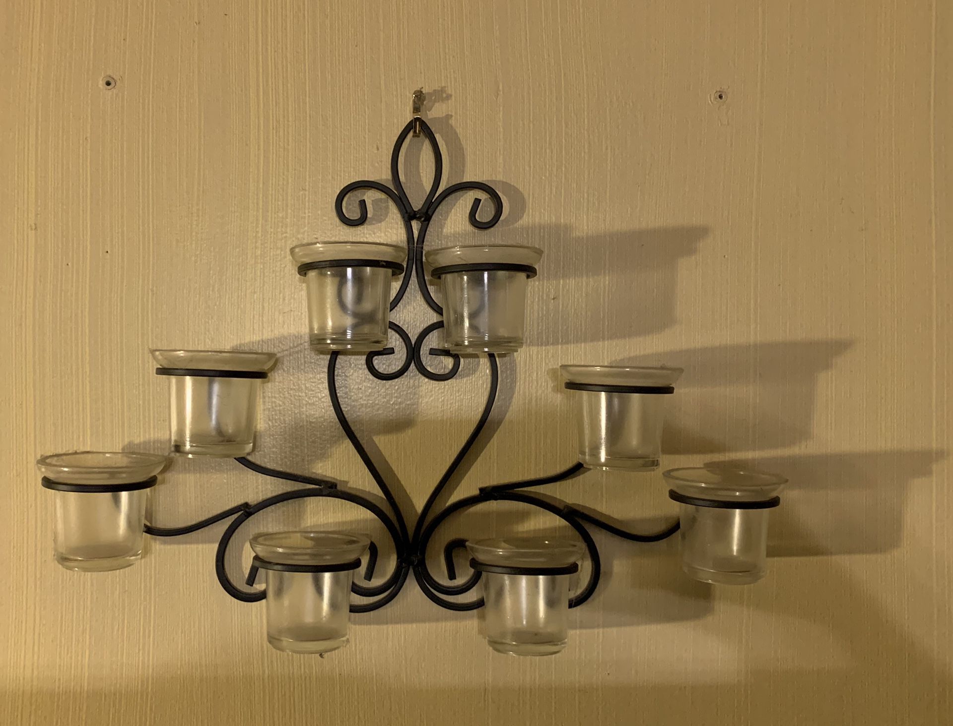 Wall accessory 8 candle votive holder.
