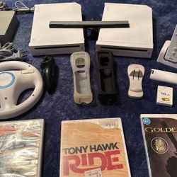 Two Nintendo Wii’s With 4 Games
