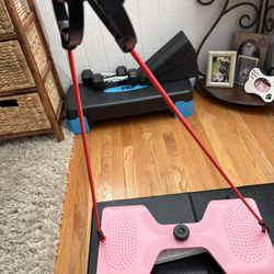 Exercise Machine For The Waist With Hand Held Tension Ropes. $20.00