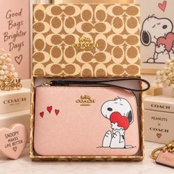 Coach x Peanuts Snoopy Pink Wristlet