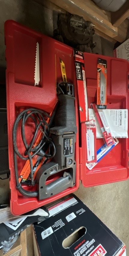 Reciprocating saw and New blades (obo)