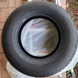 Brand New Bridgestone Dueler A/T 255/70R18 Tire – Never Used