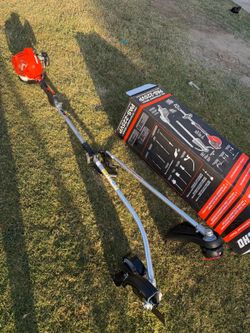 ECHO
21.2 cc Gas 2-Stroke Attachment Capable Straight Shaft String Trimmer with Speed-Feed Head and Curved Shaft Edger Kit