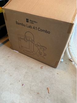 Bambu labs A1 combo with AMS lite.  3D printer. Full size not the mini