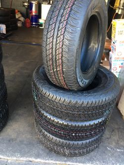 SET OF FOUR DUNLOP SEMI NEW 265/65/17 $200 INCLUDING INSTALLATION AND TAX.