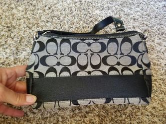 Black and white COACH purse