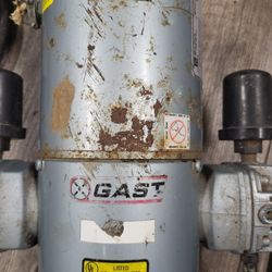 Gast 1/6 HP Air Compressor, specifically a power-operated pump for air with a maximum pressure of 100 PSIG