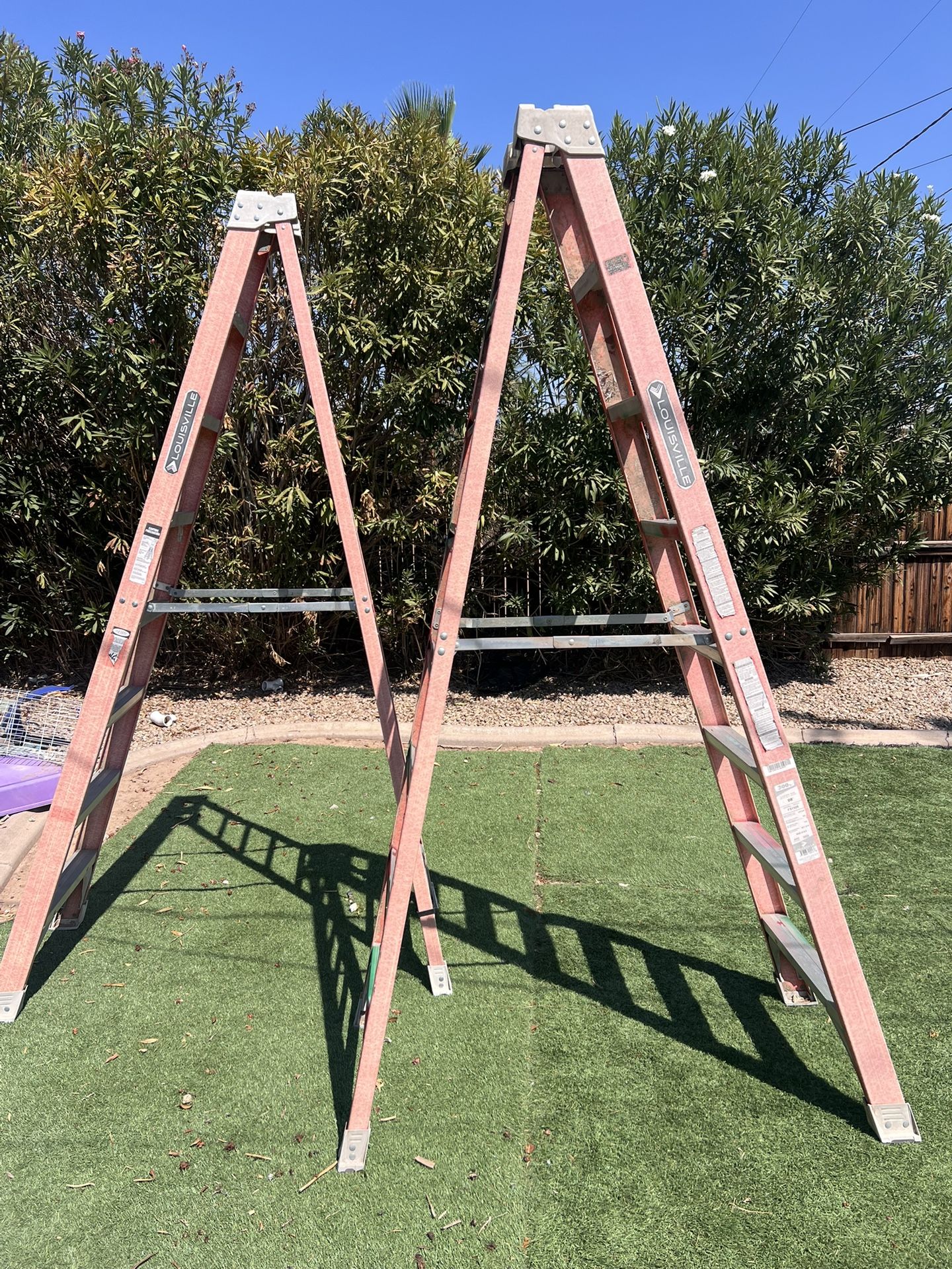 8’ Feet Louisville Ladders.