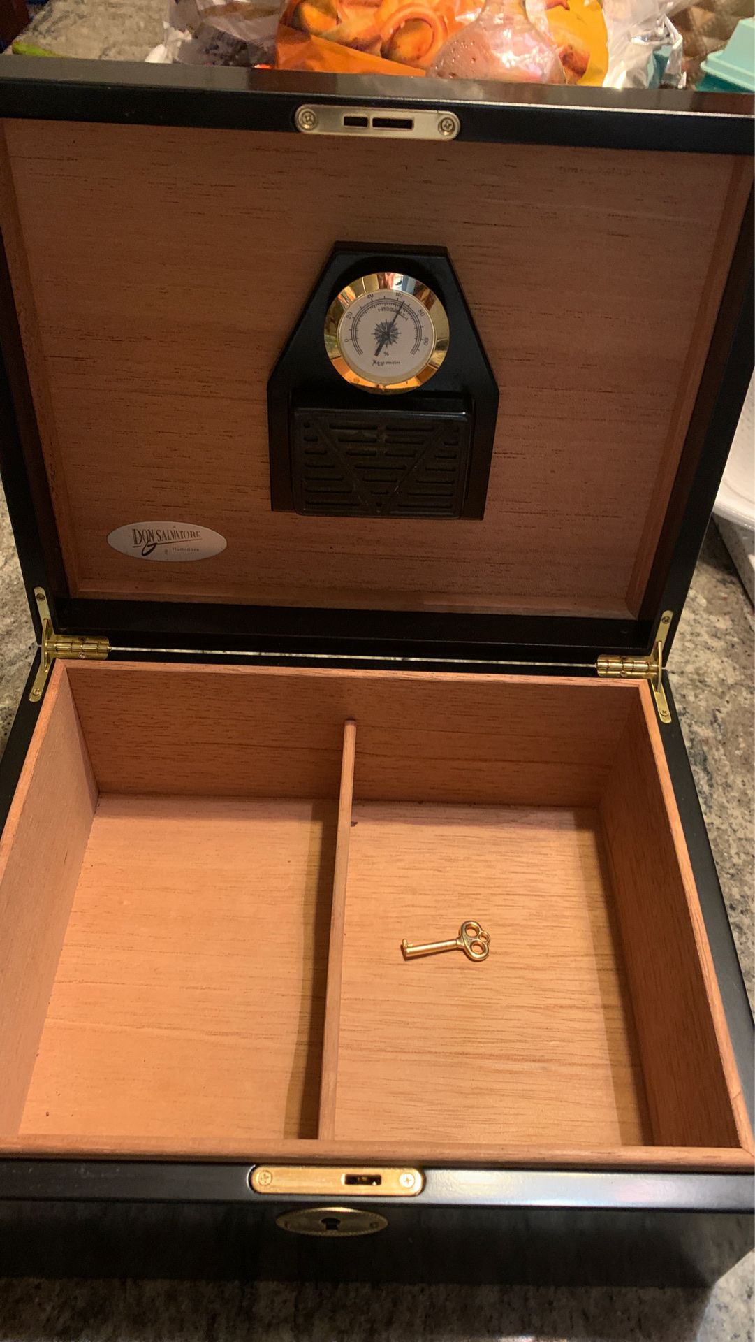 Cigar box in good condition with key