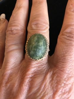 24 k gold ring with green stone
