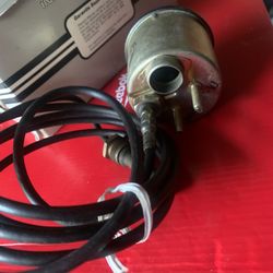 vintage Stewart-Warner mechanical oil temperature gauge.