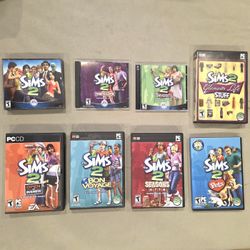 The Sims 2 PC Game + 6 Expansion Games + stuff pack + Manuals 
