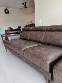 Dark brown faux-leather 3-seater sofa