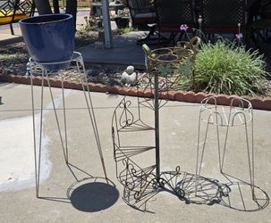3 plant stands and 1 pot holder