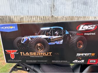 R/C 1:10 scale 4x4 racer with 2 battery packs and charging dock